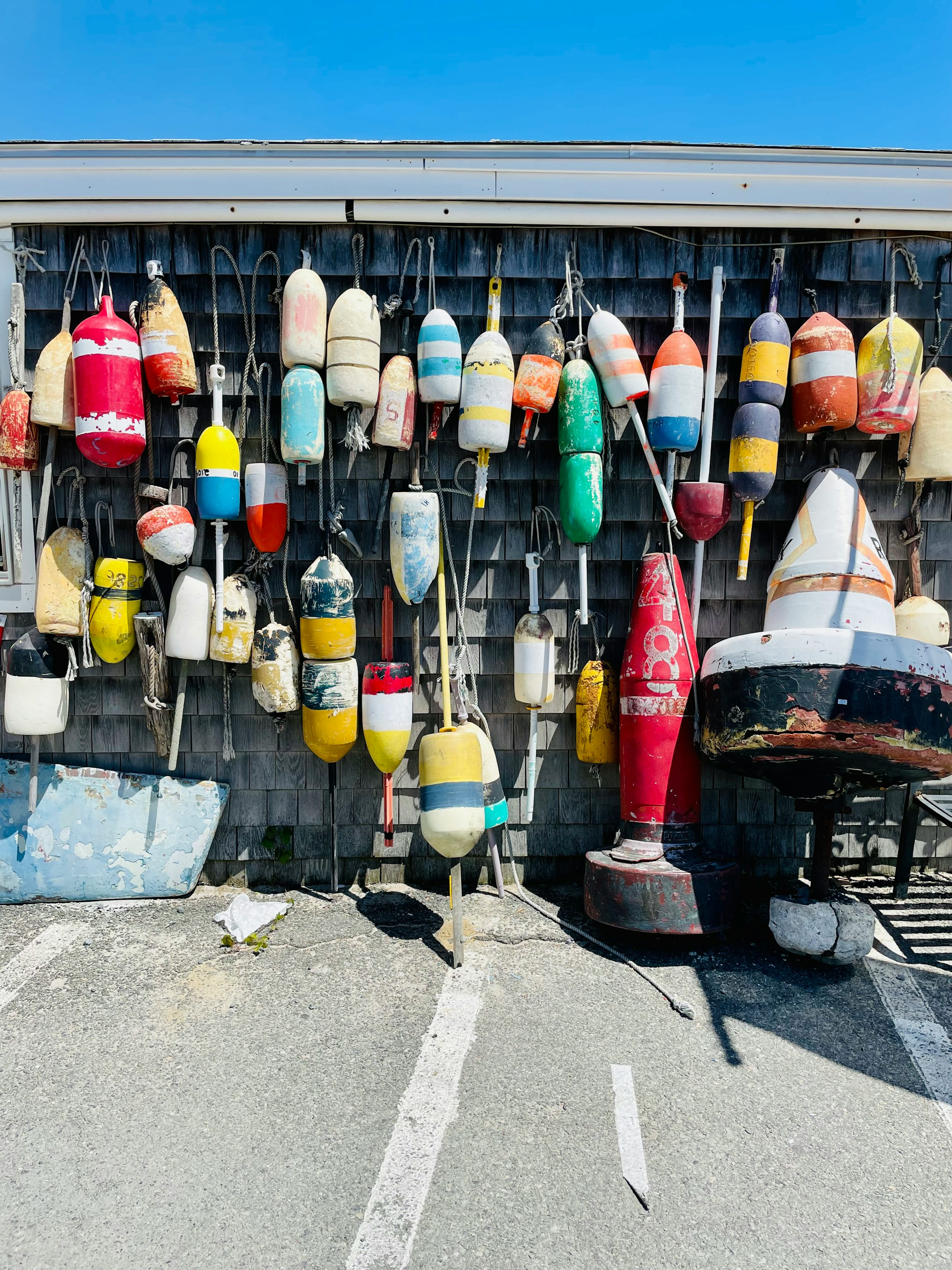 Sesuit Harbor Buoys. Photo by Taylor Rooney on Unsplash